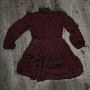 Short beautiful ruffle neck dress.